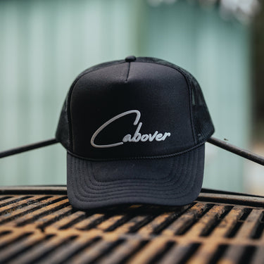 Black cap with 'Cabover'  Product Shot