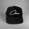 Black cap with 'Cabover'  on a gray background