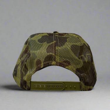 Camouflage trucker hat with mesh back, back view on a gray background