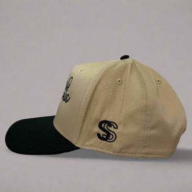 Khaki and black cap with 'Armed & Dangerous' text left view