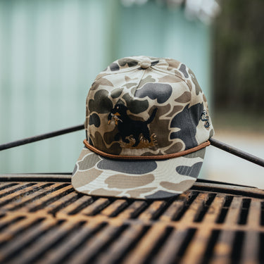 Old school duck camo cap with embroidered dog design product shot