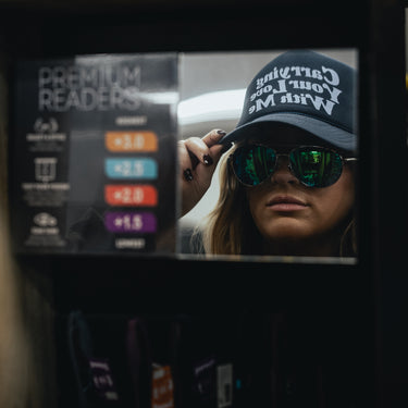 carrying your love with me trucker hat model sunglasses