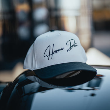 hammer down right lane trucker hat on truck