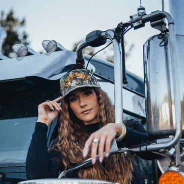 modern trucker hat model on truck